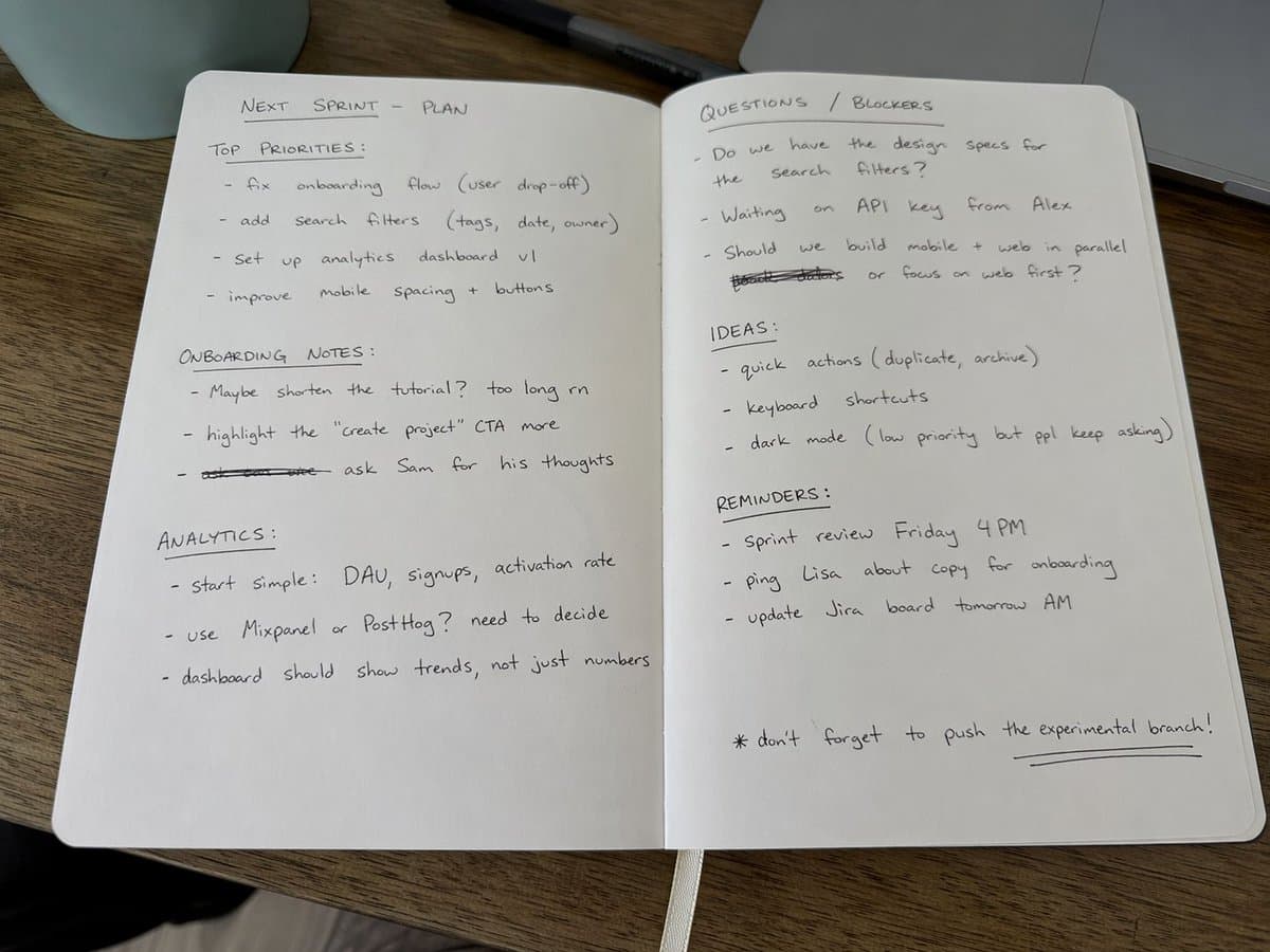 Black Ballpoint Pen Handwritten Notes on a Desk